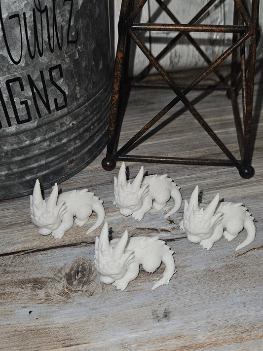 Set of 4 miniature Dragons